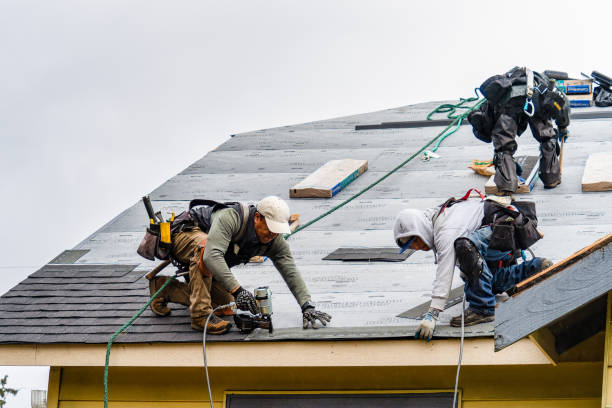 Professional Roofing technician working in Atwood, CA